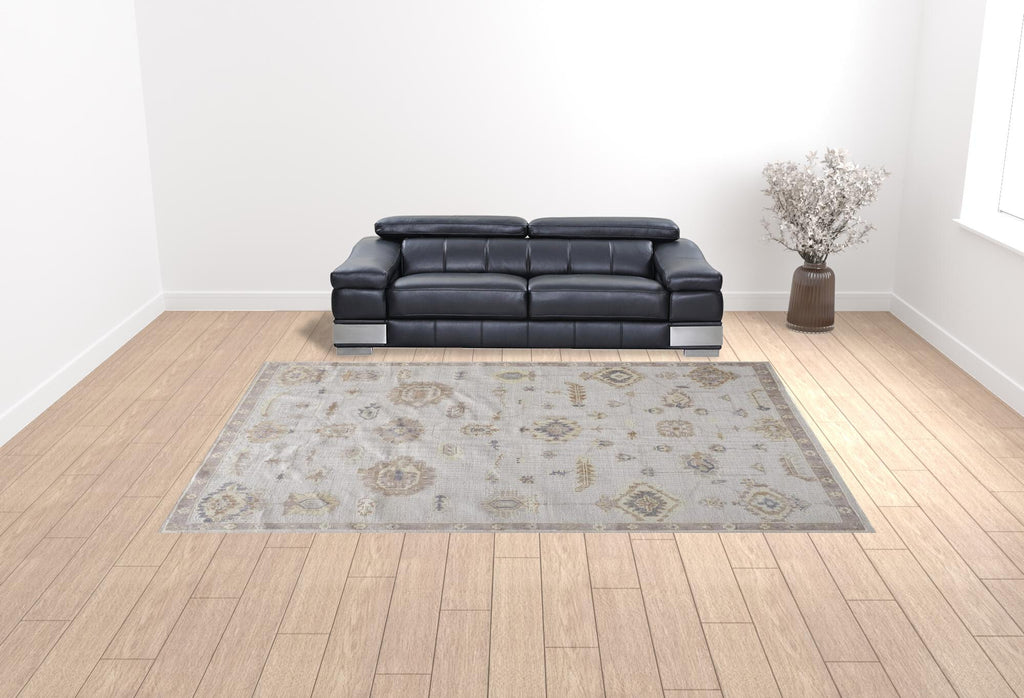 10' X 14' Ivory And Orange Floral Hand Knotted Stain Resistant Area Rug