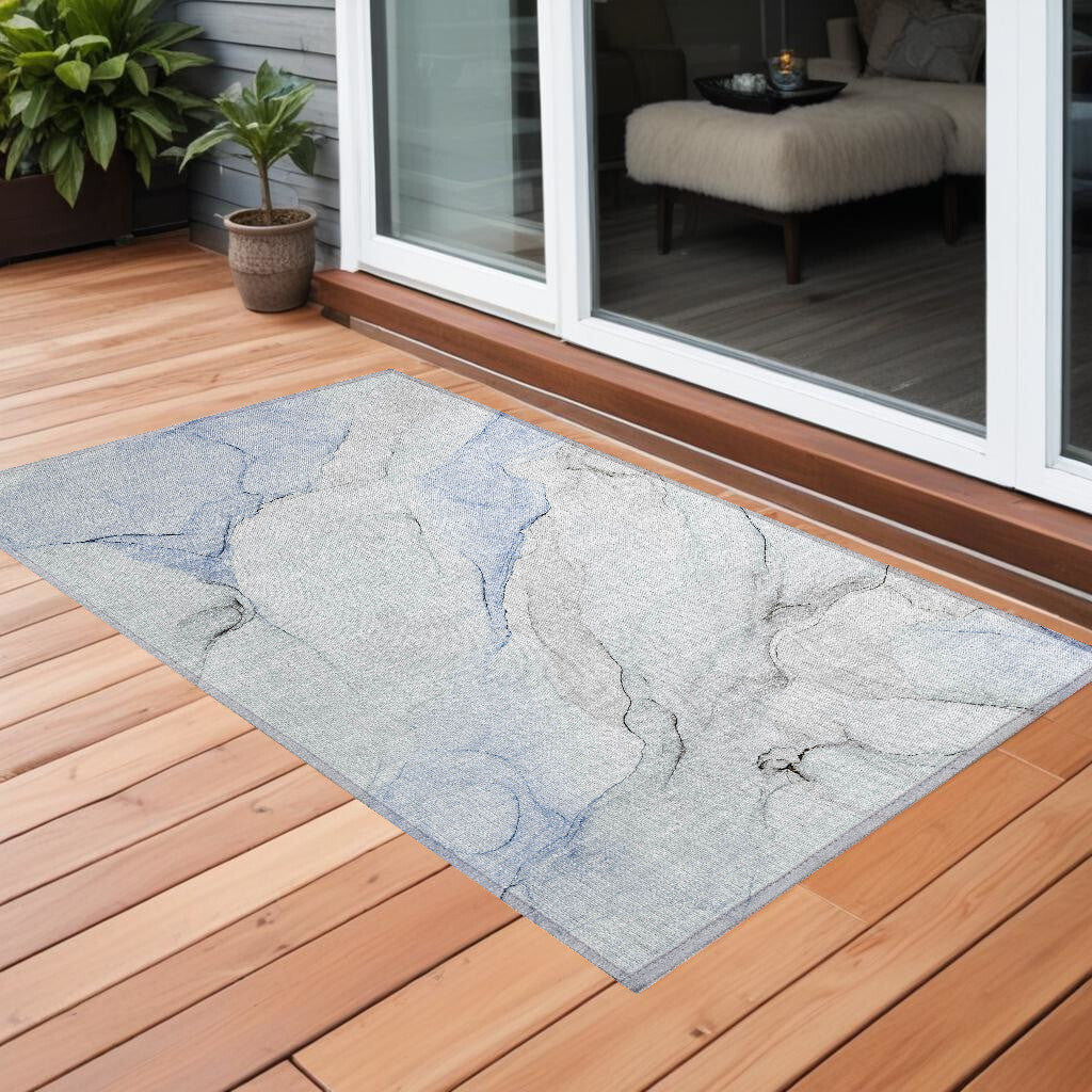 3' X 5' Ivory Blue and Gray Abstract Washable Non Skid Indoor Outdoor Area Rug