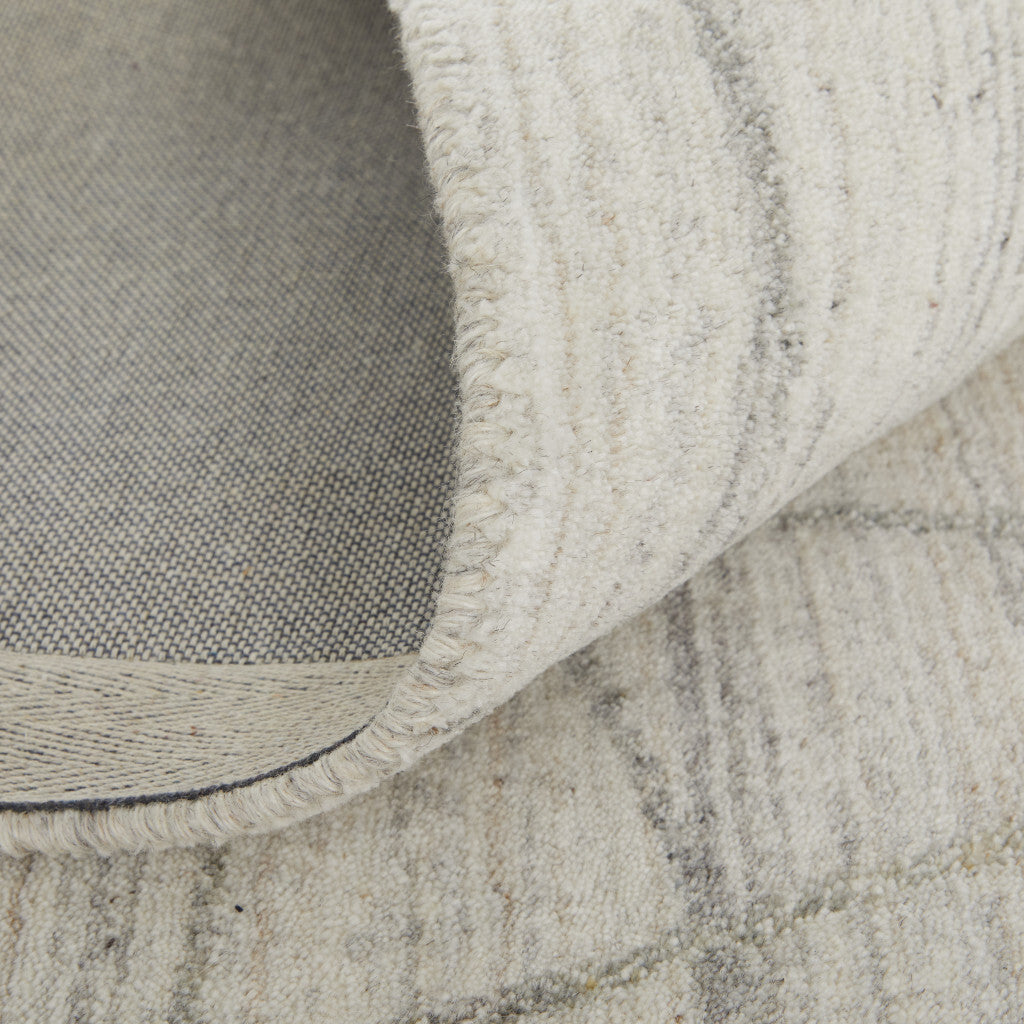 2' X 3' Gray and Ivory Abstract Hand Woven Area Rug